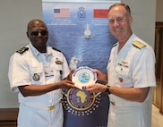 Adm. George Wikoff, Commander, U.S. Naval Forces Europe and Africa, exchanges gifts with Adm. Valentim Alberto Antonio, Commander of the Angolan Navy, in Rabat, Morocco, July 21, 2026