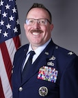 Military member poses for a photo
