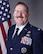 Military member poses for a photo