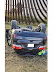 A civilian motorist leans on his damaged vehicle following a single-vehicle rollover accident in the Rio Grande Valley, Texas, July 9, 2026. U.S. Army Soldiers with the 252nd Engineer Company, assigned to the 130th Maneuver Enhancement Brigade, assigned to Joint Task Force-Southern Border in support of Operation Ardent Vanguard, discovered the accident while conducting a routine patrol and provided immediate assistance to the motorist until local authorities arrived.