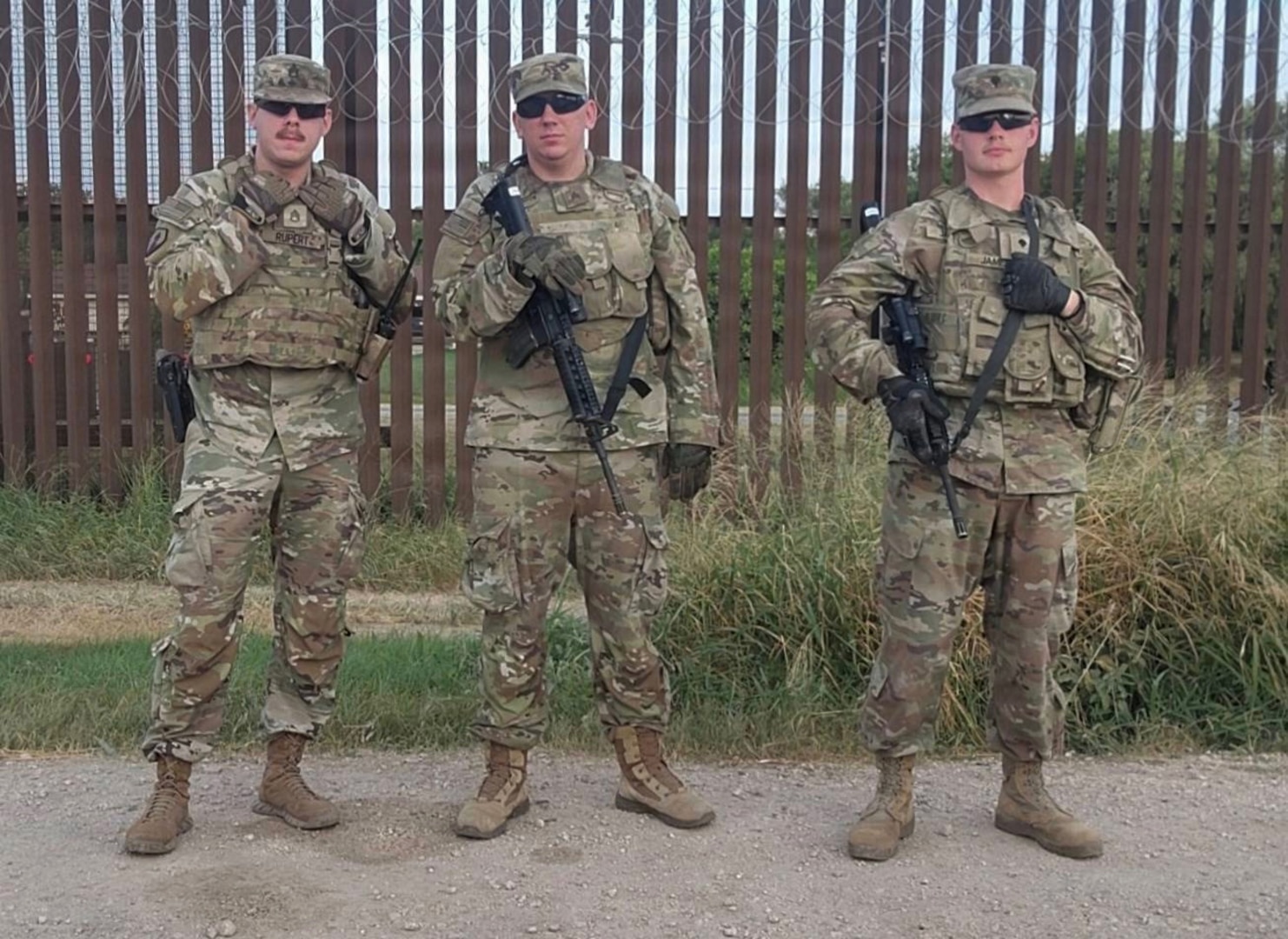 U.S. Army Soldiers with the 252nd Engineer Company, assigned to the 130th Maneuver Enhancement Brigade, assigned to Joint Task Force-Southern Border, or JTF-SB, in support of Operation Ardent Vanguard, pose for a photo in Rio Grande Valley, Texas, July 9, 2026, after assisting a driver following a single-vehicle rollover during a routine patrol.