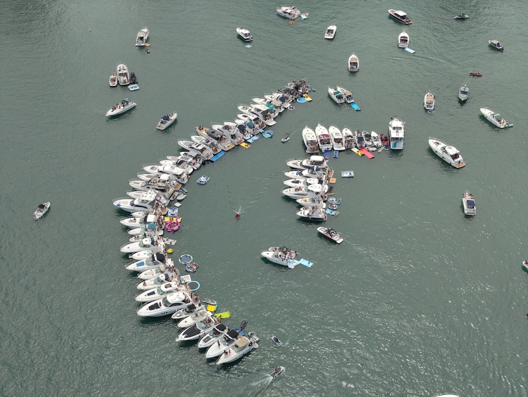 Coast Guard Marine Safety Unit Chicago personnel survey boats during a gathering in the Playpen in Chicago July 28, 2026. Coast Guard crews worked with interagency partners to keep mariners safe. (U.S. Coast Guard photo, courtesy Marine Safety Unit Chicago)