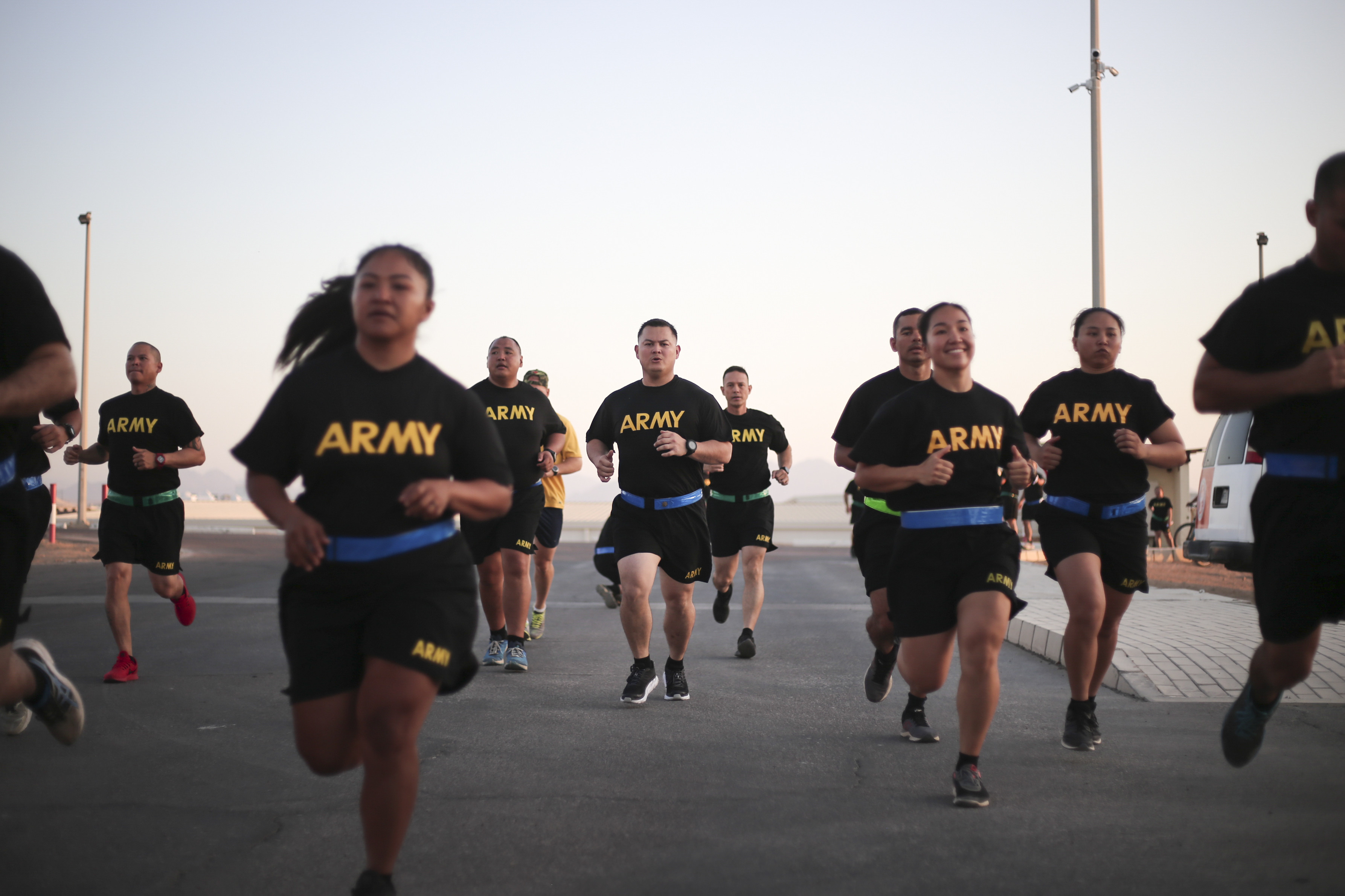 Army Body Composition Program FAQ Banner: Soldiers Running