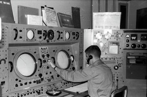 A technician manning the console at the FOX-Main station, Hall Beach, Canada (Photo courtesy of DEWLineAdventures.com)