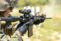U.S. Marine Corps students with Company C, Basic Officer Course 2-26, shoot an M4 carbine during the Tactical Marksmanship range at Marine Corps Base Quantico, Virginia, Jun. 17, 2026. Marines engage targets during Short Bay live-fire training, honing speed, accuracy, and tactical shooting skills. (U.S. Marine Corps photo by Cpl. Memphis Pitts)