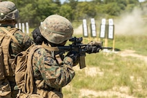 U.S. Marine Corps students with Company C, Basic Officer Course 2-26, shoot an M4 carbine during the Tactical Marksmanship range at Marine Corps Base Quantico, Virginia, Jun. 17, 2026. Marines engage targets during Short Bay live-fire training, honing speed, accuracy, and tactical shooting skills. (U.S. Marine Corps photo by Cpl. Memphis Pitts)