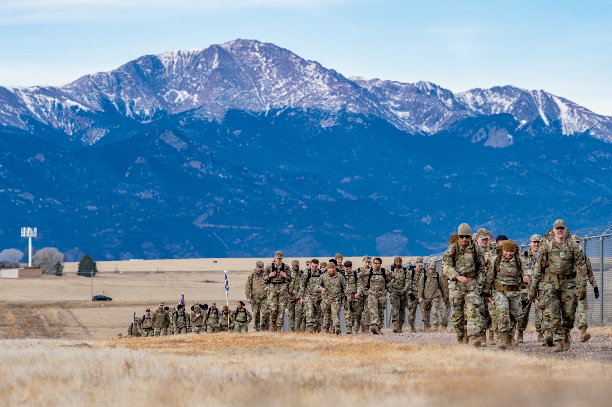 Guardians and Airmen participate in a holiday ruck march at Schriever Space Force Base, Colorado, Dec. 19, 2025.
