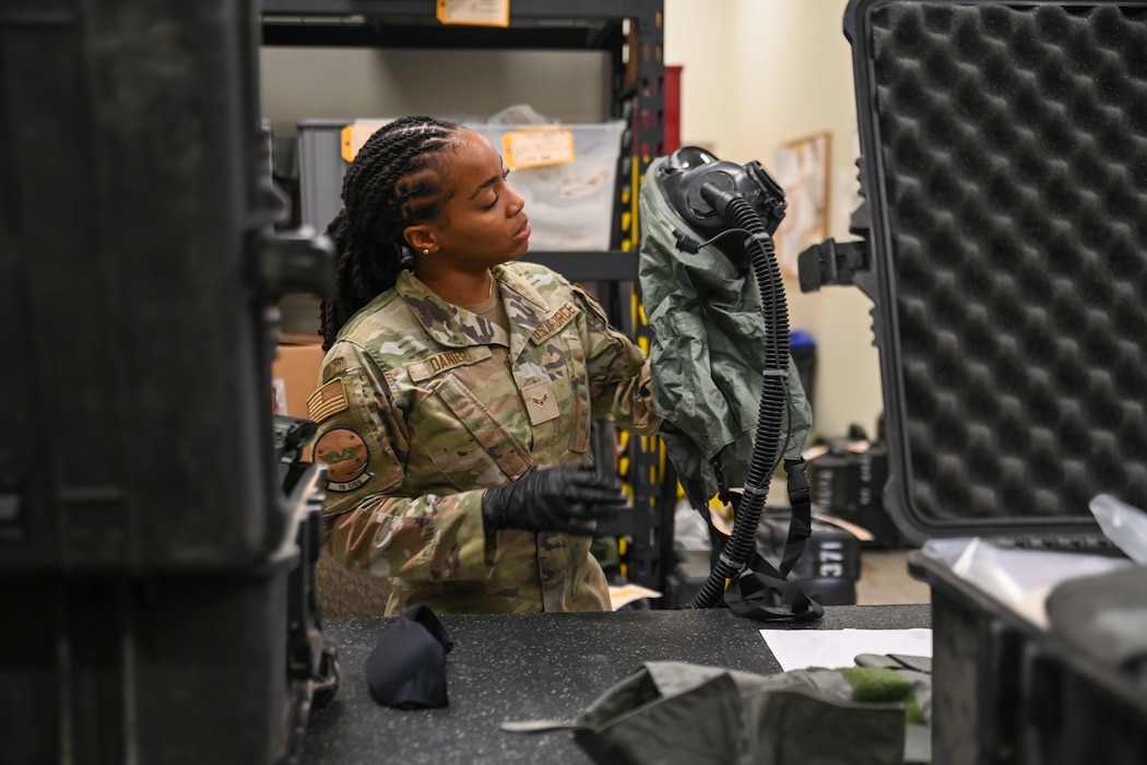 Airman working on aircrew flight equipment.