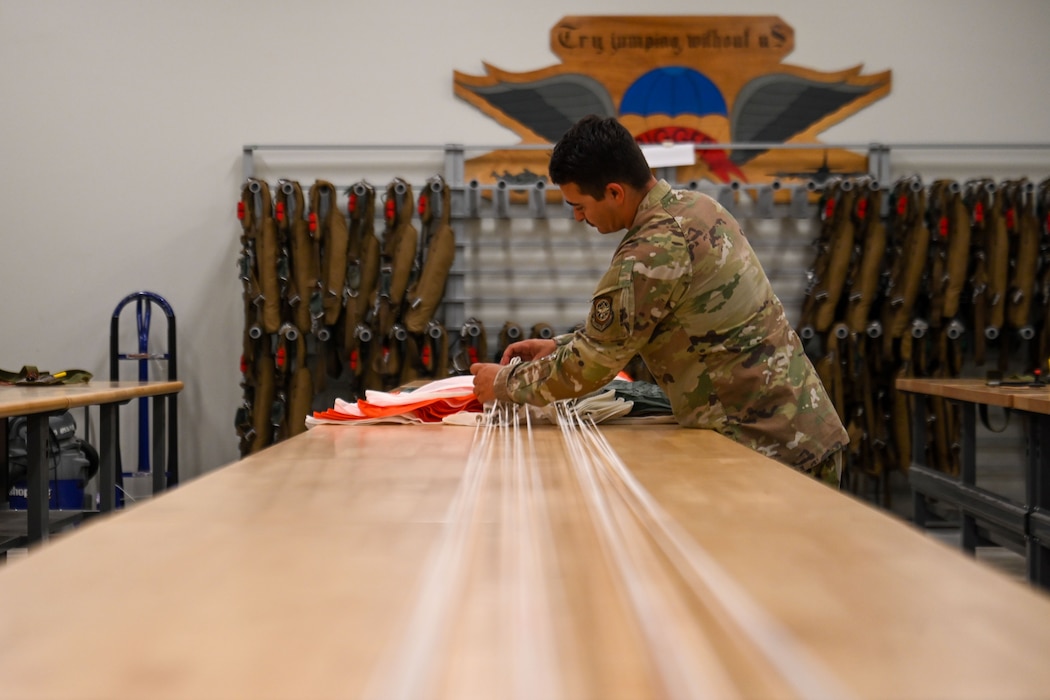 Airman working on aircrew flight equipment.
