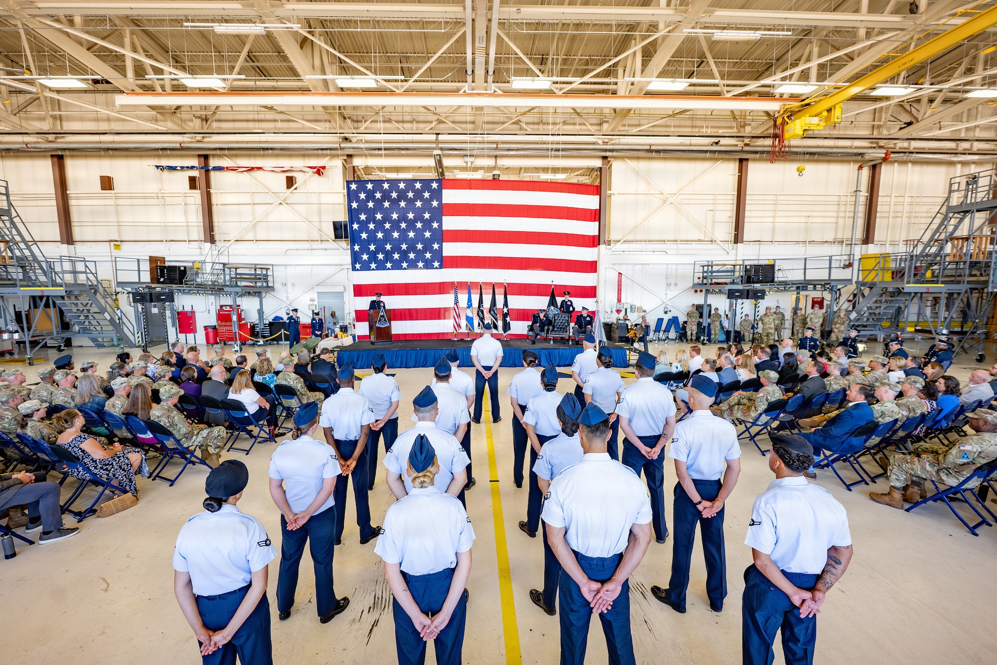 Guardians, Airmen and distinguished guests attend the Space Base Delta 1 change of command ceremony