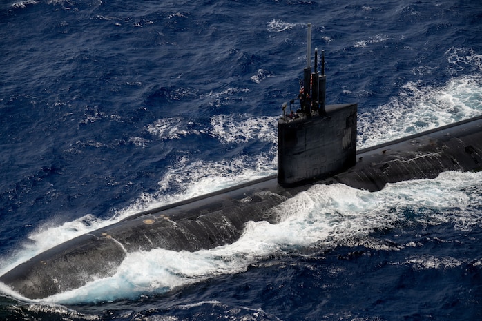 Los Angeles-class fast-attack submarine USS Charlotte (SSN 766) participates in a group sail July 22, 2026, in the Pacific Ocean off the coast of Hawaii during Exercise Rim of the Pacific 2026.