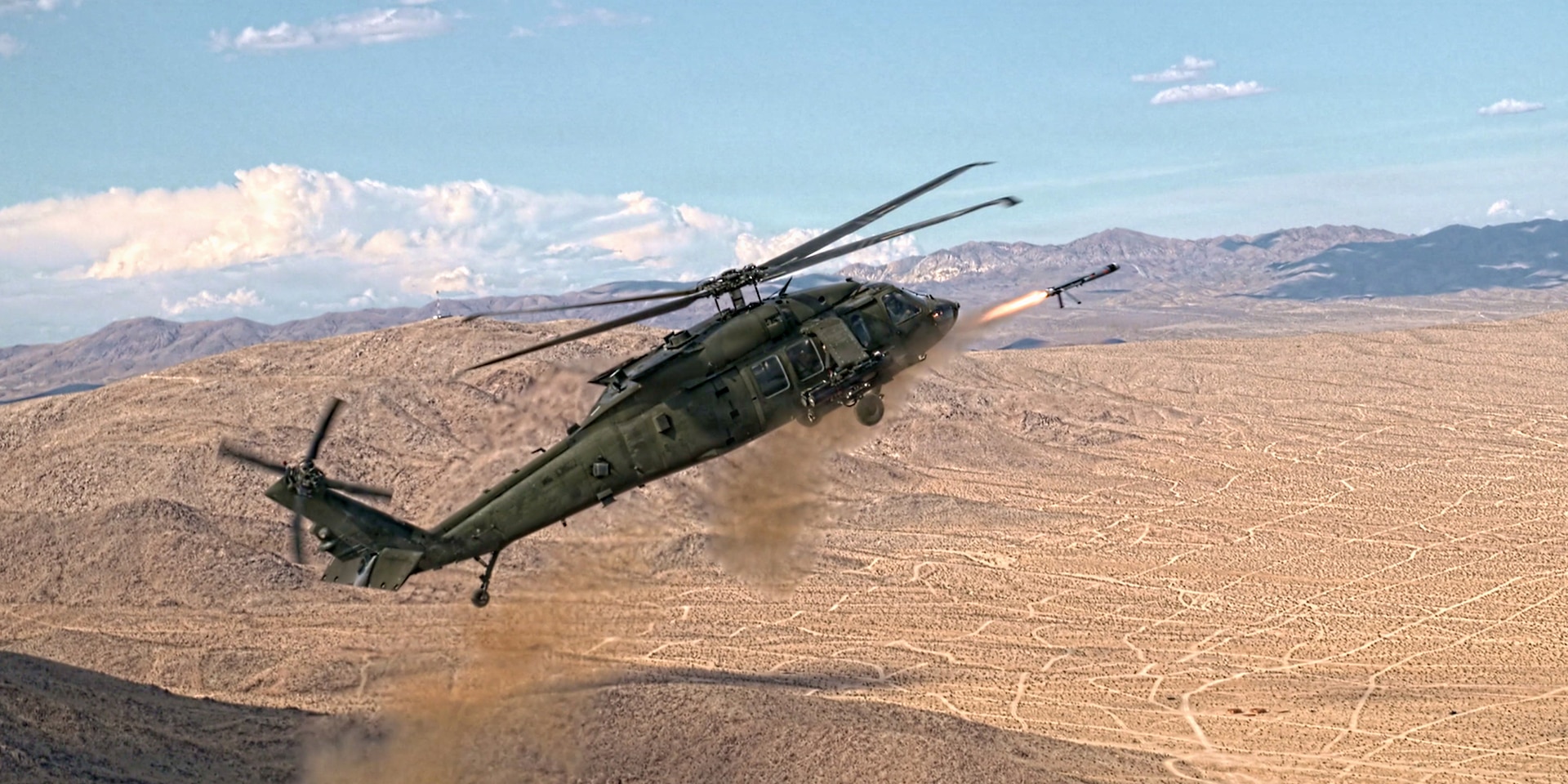 U.S. Army UH-64 Blackhawk helicopter fires off a LEDGR/UVC during Project Convergence-Capstone 6 (PCC6) at Fort Irwin, California, July 20, 2026.