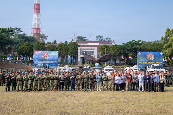 Distinguished visitors, senior military leaders and multinational participants pose for a group photo during the opening ceremony of Exercise Garuda Canti Dharma III at the Indonesian Peacekeeping Training Center, July 20, 2026.
