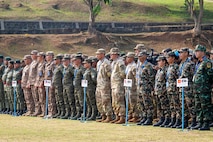 Military members from participating nations, including the United States, Nepal, the Philippines, Mongolia and Vietnam, stand in formation during the opening ceremony of Exercise Garuda Canti Dharma III at the Indonesian Peacekeeping Training Center, July 20, 2026.