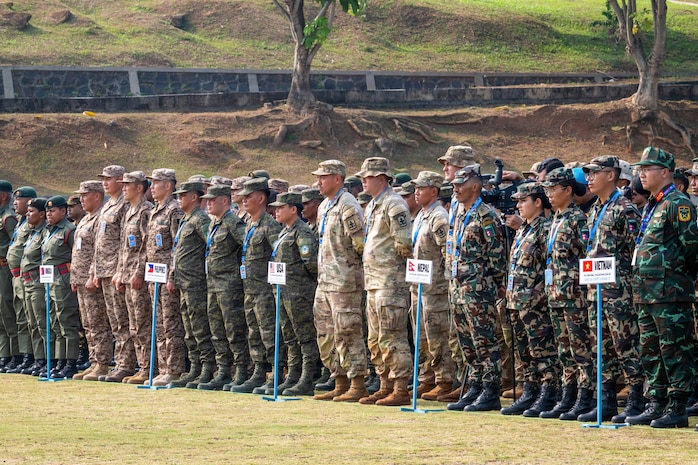 Military members from participating nations, including the United States, Nepal, the Philippines, Mongolia and Vietnam, stand in formation during the opening ceremony of Exercise Garuda Canti Dharma III at the Indonesian Peacekeeping Training Center, July 20, 2026.