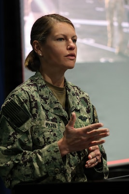 SAN DIEGO (May 14, 2026) — Lt. Stephanie Ryan, a Navy nurse with En Route Care System 11 at NMRTC San Diego, answers a question from the audience at Naval Medical Forces Pacific headquarters. Following a presentation on the Artemis II recovery mission, presentation, audience members asked about broader operational impacts, critical care gear, and transport times required to move injured patients from the recovery ship to higher-level care facilities ashore. (U.S. Navy photo by Arsenio R. Cortez Jr.)