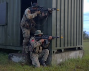 A Soldier from the Oklahoma Army National Guard and the Malaysian Army’s 5th Infantry Division take aim at enemy positions during a force-on-force exercise during Keris Strike 26 near Kota Belud, Malaysia, July 22, 2026.