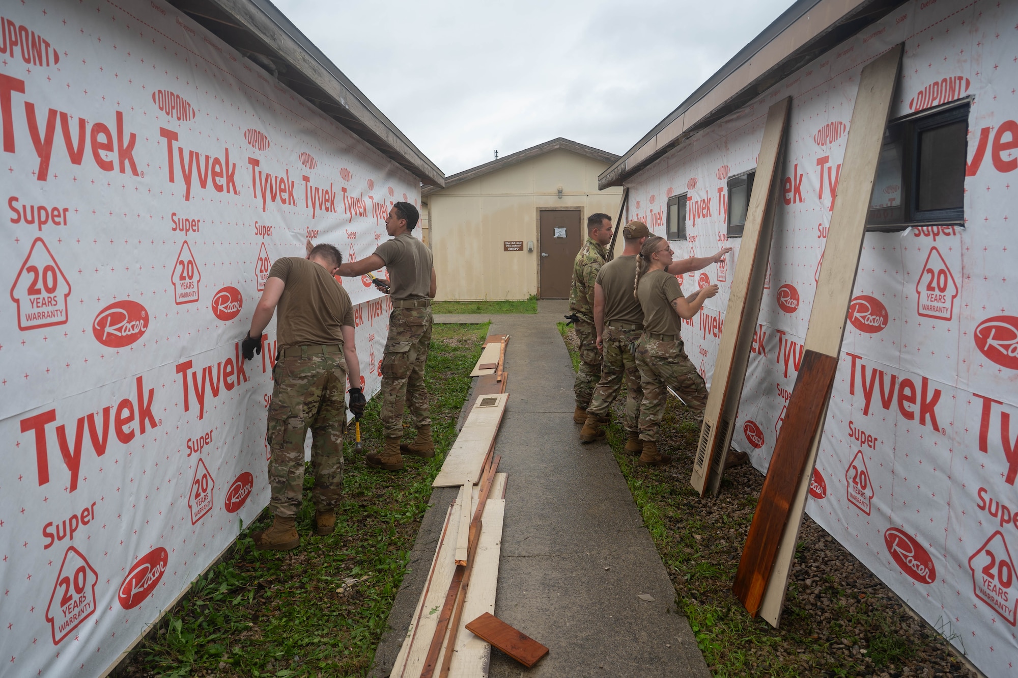 New York Air National Guardsmen assigned to the 107th Civil Engineer Squadron, Niagara Falls Air Reserve Station, New York, put up insulation during a refurbishing project at Kunsan Air Base, Republic of Korea, July 8, 2026. CE units from the Air National Guard and Air Force Reserve deployed to Kunsan to receive hands-on training, complete projects with the 8th CES and assist with additional projects around base. (U.S. Air Force photo by Staff Sgt. Cedrique Oldaker)