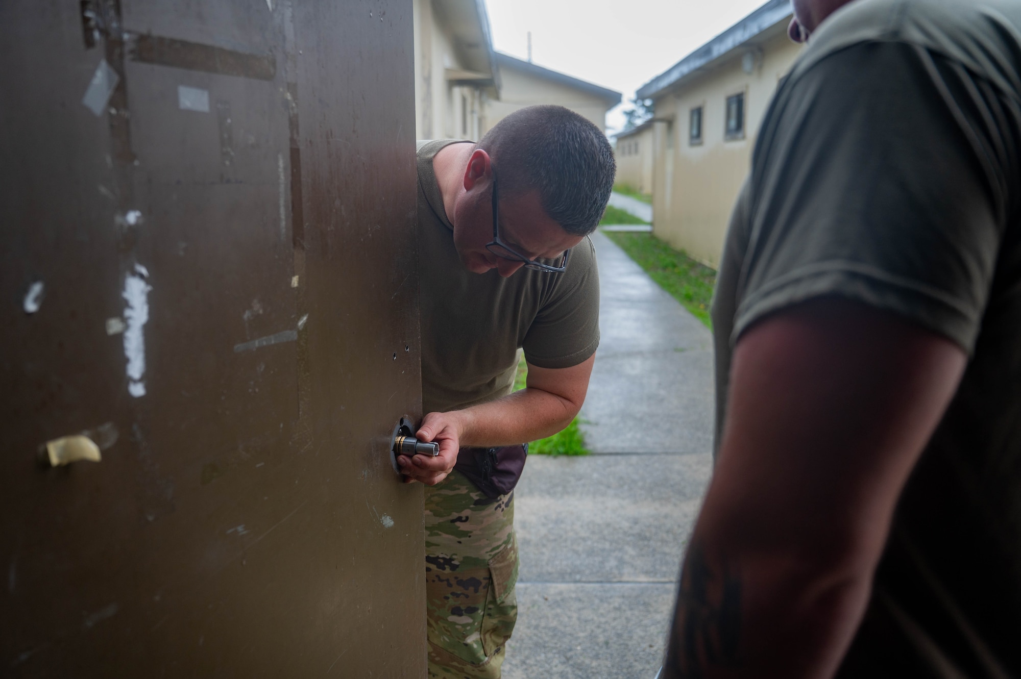 New York Air National Guard Tech. Sgt. Gary Buchanan, 107th Civil Engineer Squadron structures shop chief, assembles a lock and doorknob during a refurbishing project at Kunsan Air Base, Republic of Korea, July 8, 2026. CE units from the Air National Guard and Air Force Reserve deployed to Kunsan to receive hands-on training and help complete projects with the 8th CES. (U.S. Air Force photo by Staff Sgt. Cedrique Oldaker)