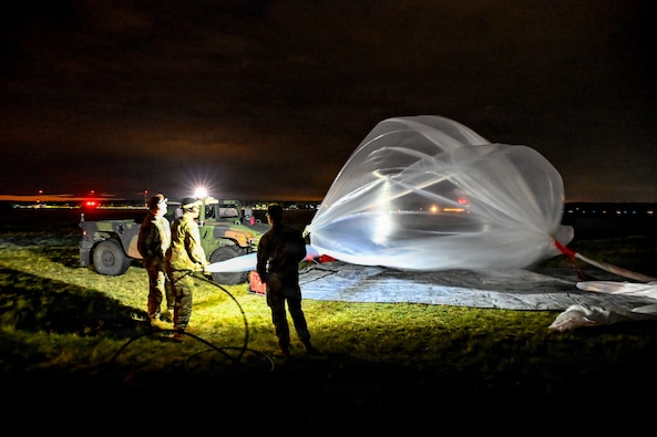 Multi-Domain Command - Europe Soldiers launch Micro High-Altitude Balloons (HABs) during a training event in Powidz, Poland in late July. The exercise validates procedures for launching, monitoring, controlling, and recovering high-altitude platforms while evaluating experimental payloads and operational concepts in a realistic operating environment. (US Army Photo by Sergeant First Class Rajheem A. Dixon)