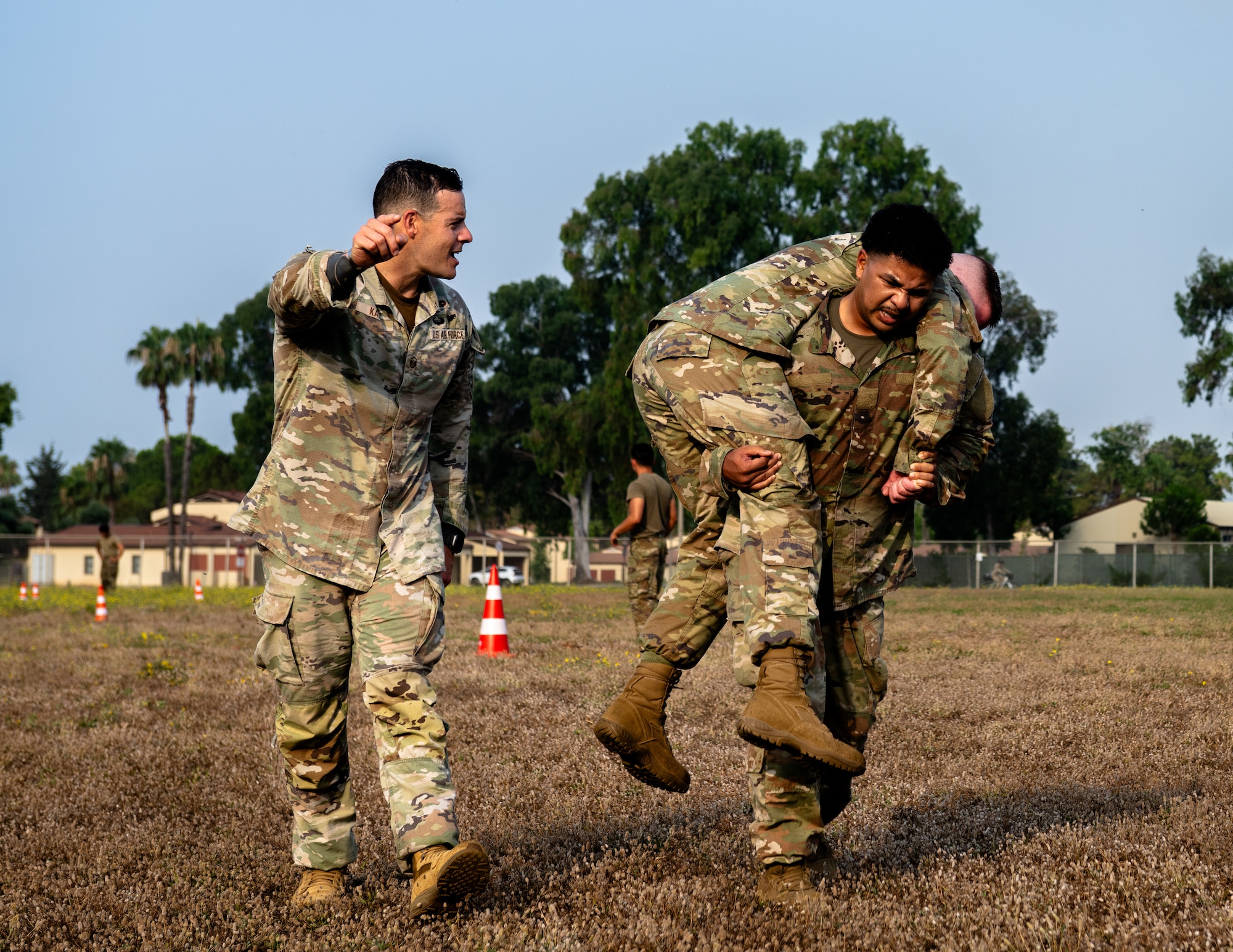 U.S. Air Force Master Sgt. Matthew Katz, 39th Air Base Wing aviation safety superintendent, motivates Senior Airman Kris Pham, an Airman Leadership School student,