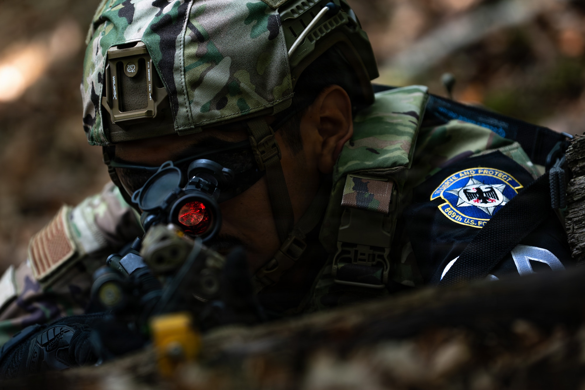 U.S. Air Force Airman 1st Class Kevin Martinez, 569th U.S. Forces Police Squadron patrolman, scans the perimeter for targets with his scope at Kapaun Air Station, Germany, July 23, 2026.