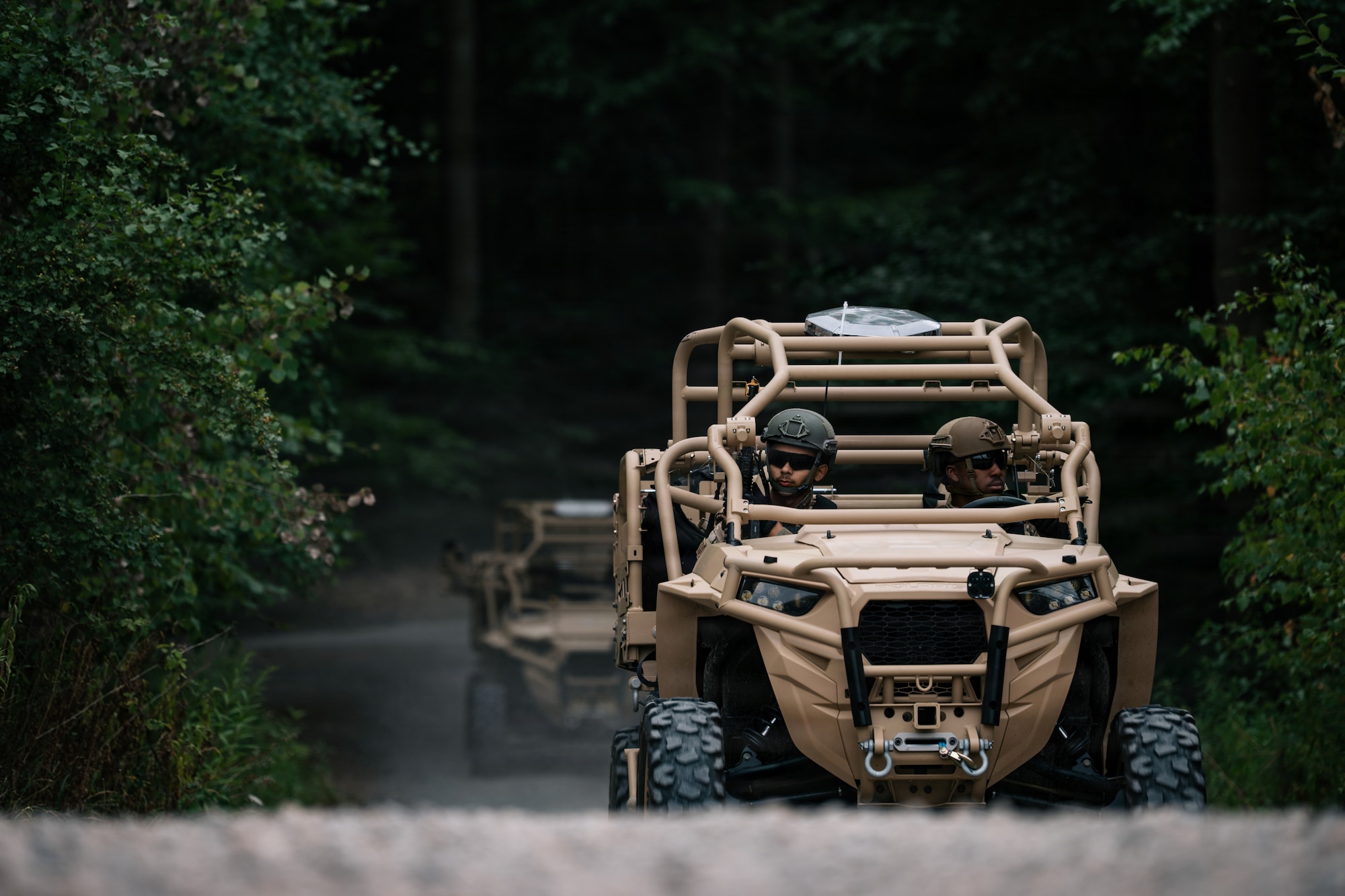U.S. Air Force Airmen assigned to the 569th U.S. Forces Police Squadron drive a Polaris MRZR during a simulated patrol at Kapaun Air Station, Germany, July 23, 2026.