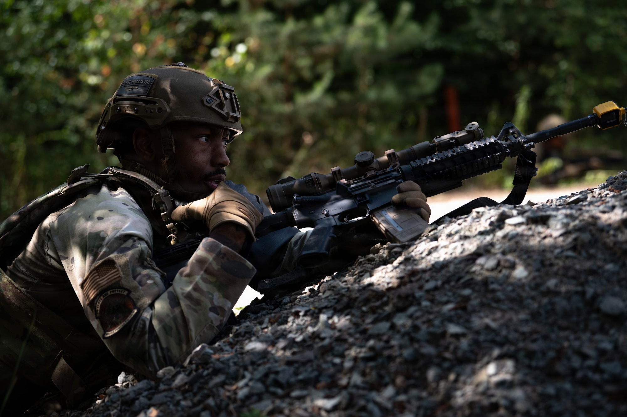 U.S. Air Force Senior Airman Rodney Richburg, 569th U.S. Forces Police Squadron patrolman, talks on the radio during a field training exercise at Kapaun Air Station, Germany, July 23, 2026.