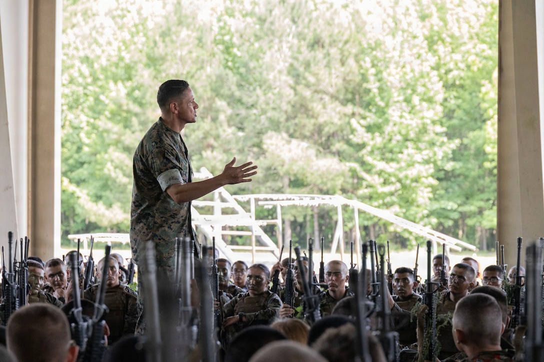 U.S. Marine Corps Sgt. Maj. Carlos A. Ruiz, the 20th Sergeant Major of the Marine Corps, visits students and staff of Marine Combat Training Battalion, School of Infantry-East, Camp Devil Dog, North Carolina, June 10, 2026. During his visit, Ruiz observed training, spoke with students and staff, and received quality of life updates. (U.S. Marine Corps photo by Gunnery Sgt. Jordan E. Gilbert)
