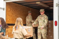 West Virginia and Connecticut National Guardsmen helping at Scouting America's 2026 National Jamboree loaded 2,500 hygiene kits assembled by Scouts and Jamboree volunteers as well as nearly 2,500 cleaning bucket kits to be delivered to the Weston and Buckhannon Disaster Relief centers.