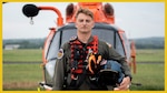 U.S. Coast Guard Petty Officer 3rd Class Scott Ruskan, a rescue swimmer assigned to Air Station Corpus Christi, poses for a photo at the Kerrville Airport in Kerrville, Texas, July 6, 2025. Ruskan responded to flash flooding in the Texas Hill Country as part of a Coast Guard aircrew conducting search and rescue operations. (U.S. Coast Guard photo by Petty Officer 3rd Class Perry Shirzad)
