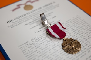 A Meritorious Service Medal lies ready for presentation before the 17th Training Squadron Change of Command Ceremony, Goodfellow Air Force Base, Texas, July 23, 2026.