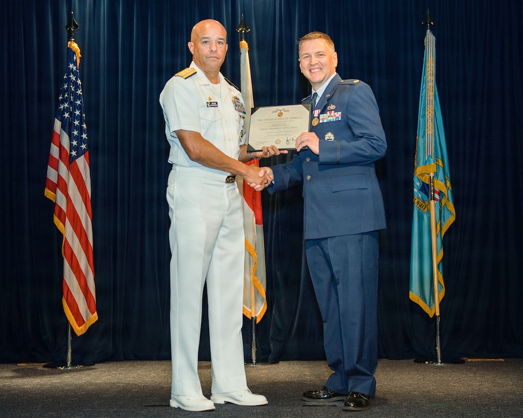 man presented an award