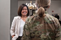Retired Chief Master Sgt. of the Air Force JoAnne S. Bass, left, talks with an Air Force leader during an Air Force and Space Force Senior Noncommissioned Officer Summit at JBAB, Washington, D.C., July 27, 2026. The summit featured a series of briefings focused on preparing senior enlisted leaders to develop and mentor the next generation of Airmen and Guardians while emphasizing the critical importance of keeping the force informed and ready to address the challenges posed by strategic competitors. (U.S. Air Force photo by Senior Airman Geneva Nguyen)