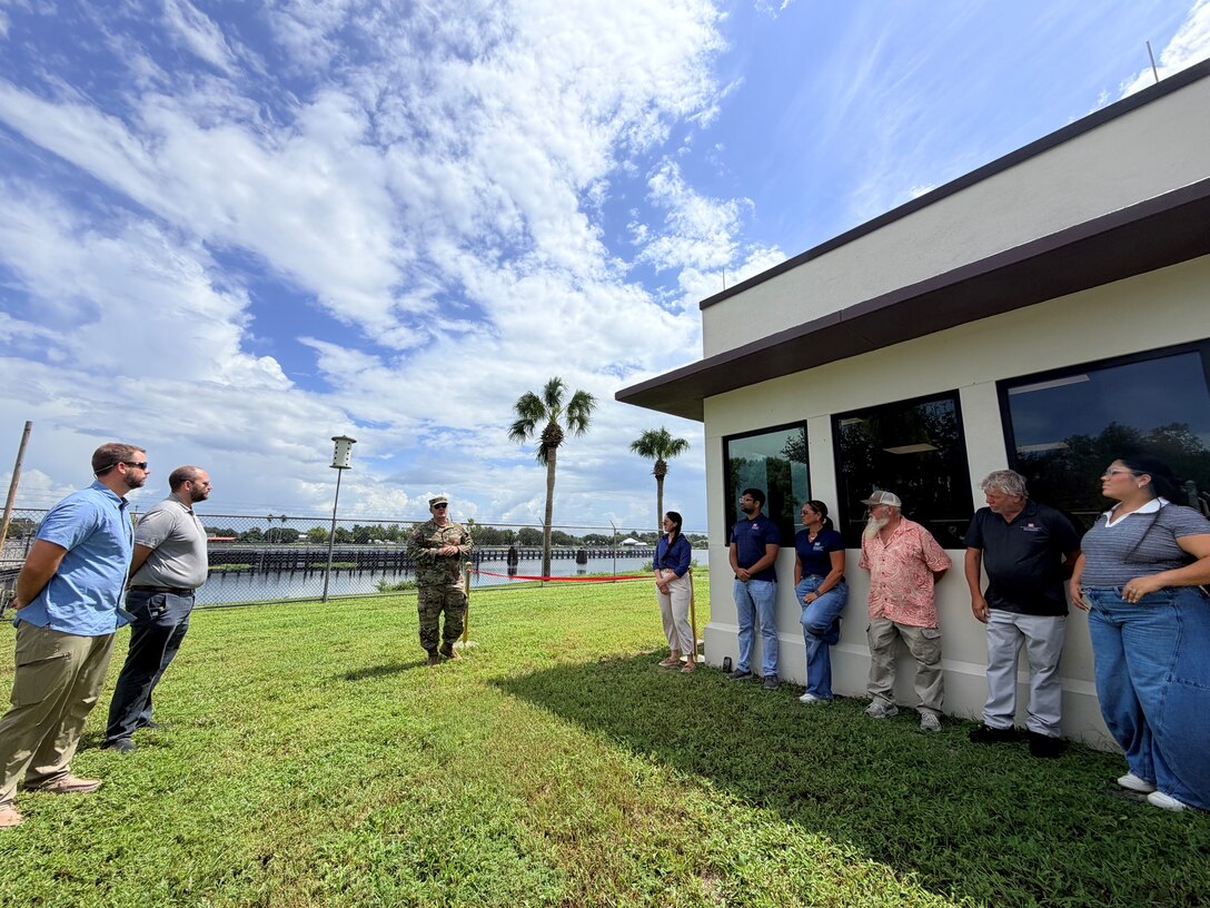 Col. Brandon Bowman, Jacksonville District commander, addresses the crowd and thanks the team for bringing the project across the finish line. “It took a lot of blood sweat, and tears to bring this across the line. We did it,” he said. (USACE photo by Peggy Bebb)