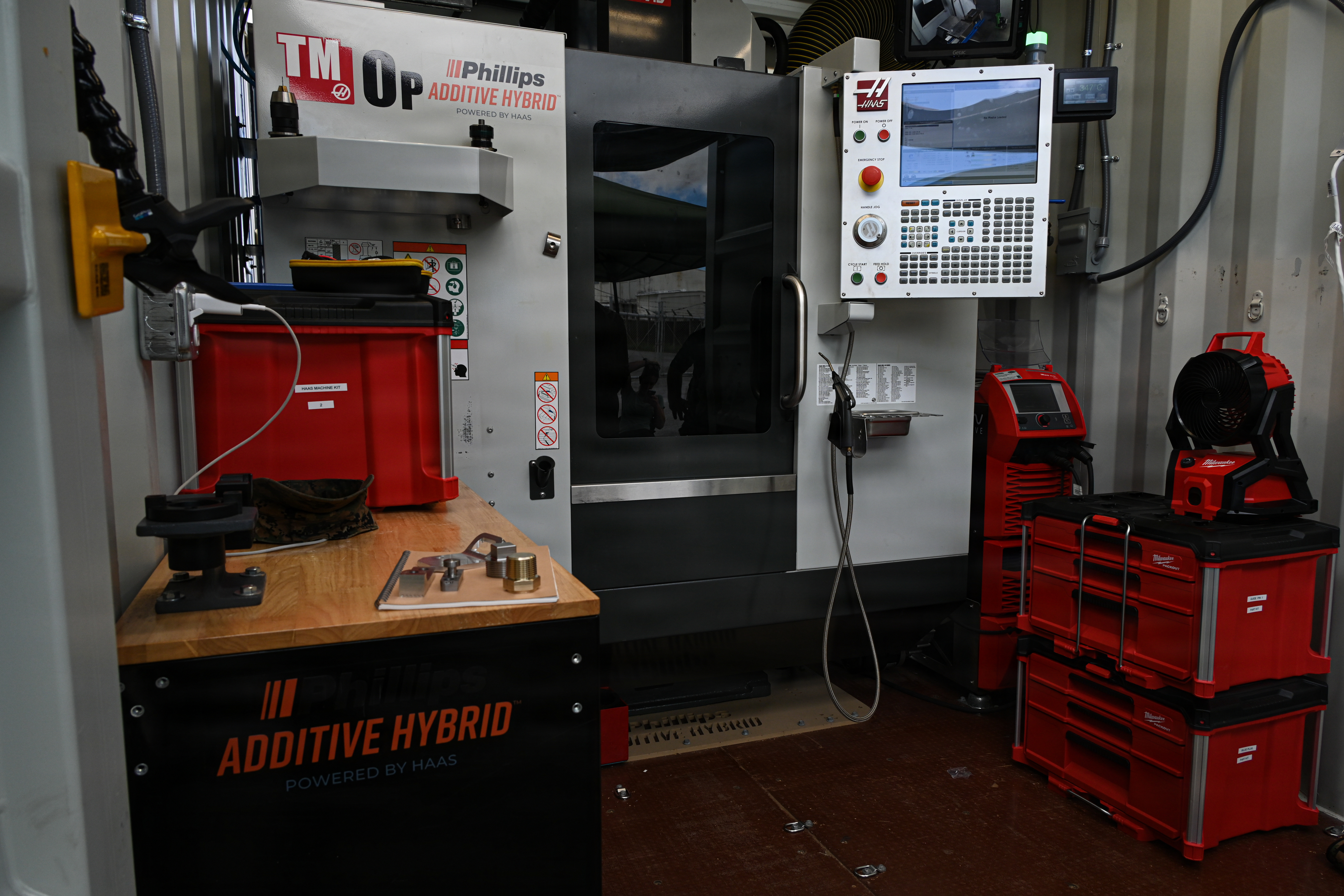 An air-transportable hybrid container supplied with an additive hybrid machine is displayed during Valiant Shield 26 on Camp Kinser, Okinawa, Japan, June 22, 2026. Marines with Intermediate Repair Company, 3rd Maintenance Battalion, 3rd Marine Logistics Group, participated in Resilient Advanced Manufacturing for Contested Environments, or RAMFORCE, an initiative hosted by the Office of the Under Secretary of Defense for Research and Engineering. The innovative event brought together military personnel, government laboratories, and private industry to evaluate how advanced manufacturing technologies could enable expeditionary forces to repair, replace and even produce critical equipment at the point of need. (U.S. Marine Corps photo by Cpl. Rachel Mason)