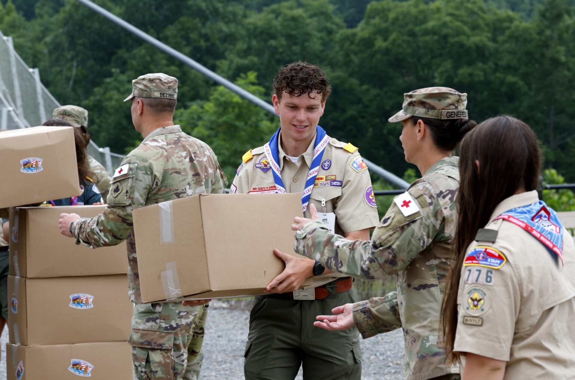 West Virginia and Connecticut National Guard Soldiers help load 2,500 hygiene kits assembled at Scouting America's 2026 National Jamboree by Scouts and Jamboree volunteers as well as nearly 2,500 cleaning bucket kits to be delivered to the Weston and Buckhannon Disaster Relief centers.