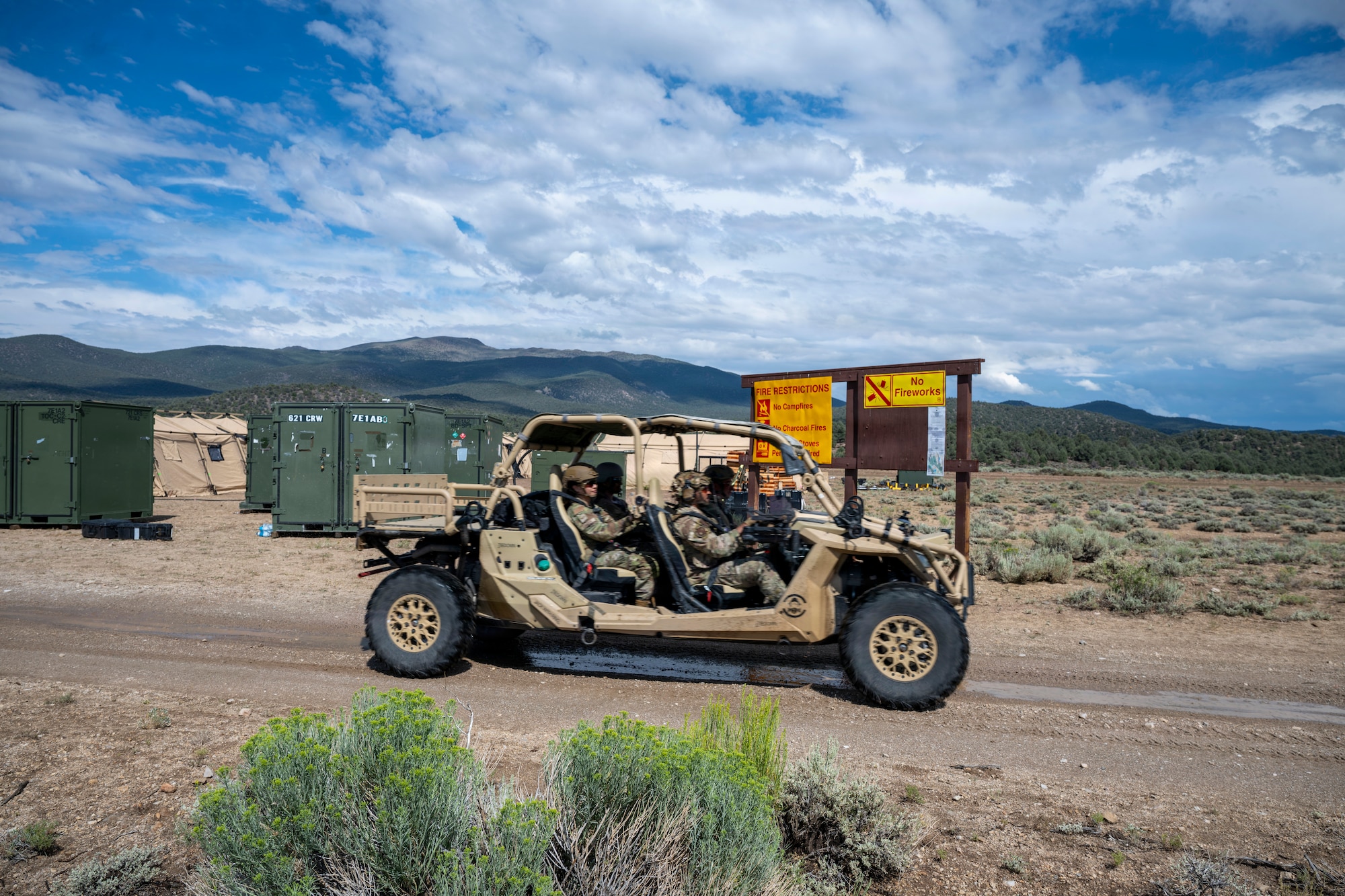 Airmen operate a military vehicle during training.