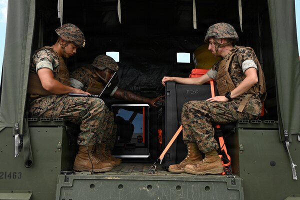 U.S. Marines with Intermediate Repair Company, 3rd Maintenance Battalion, 3rd Marine Logistics Group, prepare to test print on-the-move capabilities during Valiant Shield 26 on Camp Kinser, Okinawa, Japan, June 22, 2026. IRC Marines participated in Resilient Advanced Manufacturing for Contested Environments, or RAMFORCE, an initiative hosted by the Office of the Under Secretary of Defense for Research and Engineering. The innovative event brought together military personnel, government laboratories, and private industry to evaluate how advanced manufacturing technologies could enable expeditionary forces to repair, replace and even produce critical equipment at the point of need. (U.S. Marine Corps photo by Cpl. Rachel Mason)