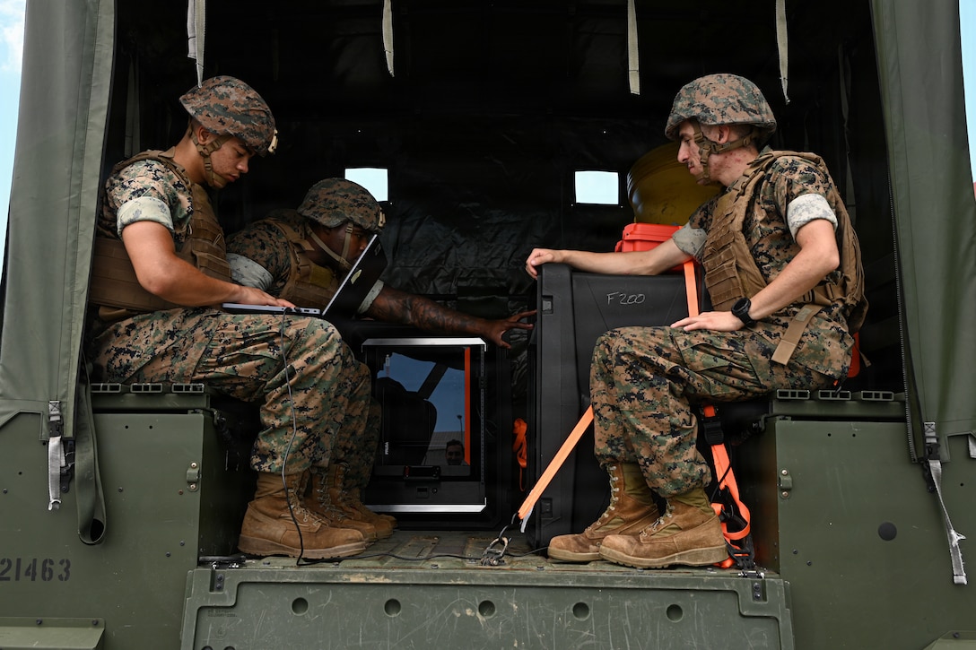 U.S. Marines with Intermediate Repair Company, 3rd Maintenance Battalion, 3rd Marine Logistics Group, prepare to test print on-the-move capabilities during Valiant Shield 26 on Camp Kinser, Okinawa, Japan, June 22, 2026. IRC Marines participated in Resilient Advanced Manufacturing for Contested Environments, or RAMFORCE, an initiative hosted by the Office of the Under Secretary of Defense for Research and Engineering. The innovative event brought together military personnel, government laboratories, and private industry to evaluate how advanced manufacturing technologies could enable expeditionary forces to repair, replace and even produce critical equipment at the point of need. (U.S. Marine Corps photo by Cpl. Rachel Mason)