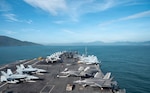Nimitz-class aircraft carrier USS George Washington (CVN 73) pulls into Da Nang, Vietnam for a scheduled port visit, July 30th, 2026. George Washington is the U.S. Navy’s premier forward-deployed aircraft carrier, a long-standing symbol of the United States’ commitment to maintaining a free and open Indo-Pacific, while operating alongside allies and partners across the U.S. Navy’s largest numbered fleet. (U.S. Navy photo by Mass Communication Specialist 3rd Class Juan Cordova)