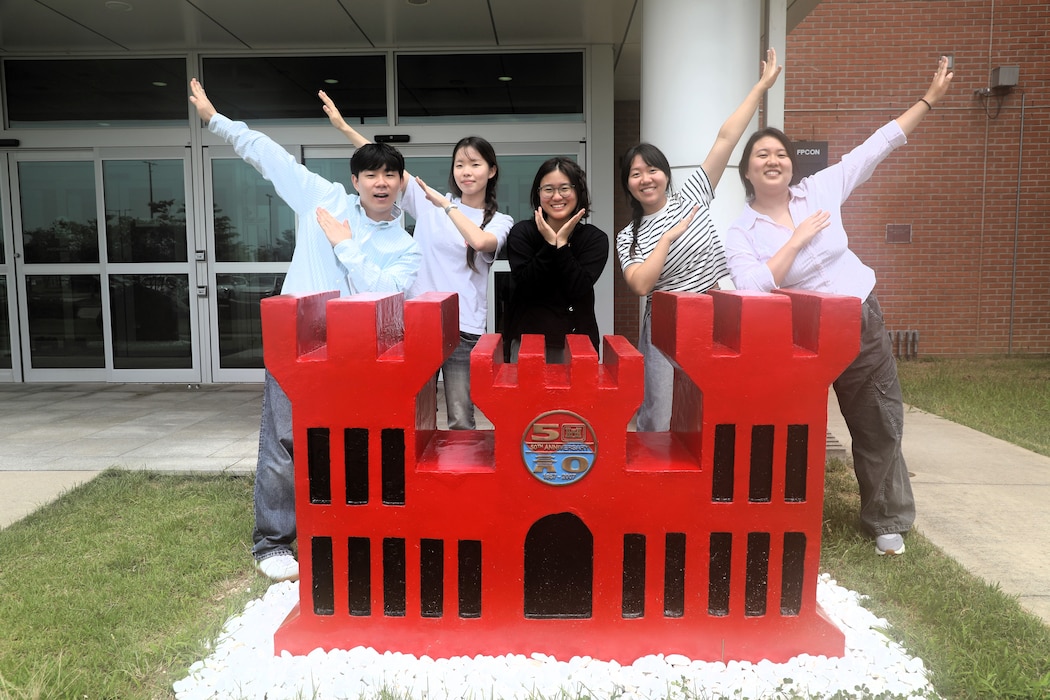 From left, Daniel Kim, Chaeun Lee, Hanna Chung, Suhrim Paek and Kay Kim, participants in the 2026 U.S. Army Corps of Engineers – Far East District Engineering Division Summer Internship Program, pose for a group photo in front of the Far East District headquarters building at Camp Humphreys, Republic of Korea, July 28, 2026. The internship program provided university students with hands-on experience through multidisciplinary engineering projects, technical training, leadership development and mentorship, introducing them to the U.S. Army Corps of Engineers' mission while preparing the next generation of engineering and public service professionals. (U.S. Army photo by Yohan An)