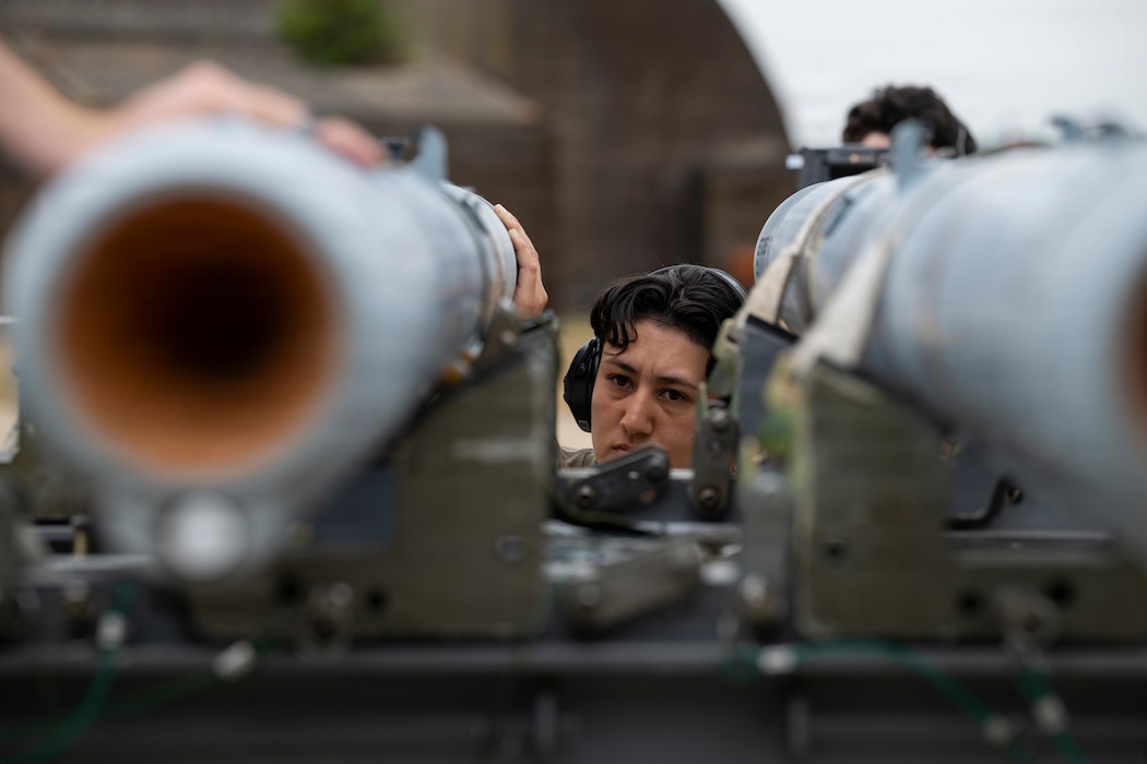U.S. Air Force Airman 1st Class Evelyn Garcia, 493rd Aircraft Maintenance Unit weapons load crew member, prepares an AIM-120 Advanced Medium-Range Air-to-Air Missile to be loaded during Combat Archer-UK 26 at RAF Lakenheath, England
