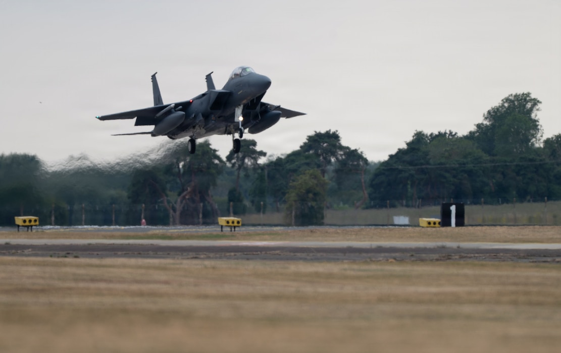 A U.S. Air Force F-15E Strike Eagle returns from a live-fire mission during Combat Archer-UK 26 at RAF Lakenheath, England