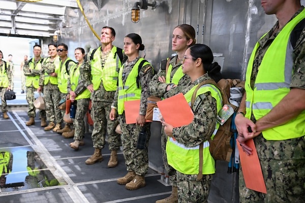 U.S. Navy Sailors tour the expeditionary fast transport ship USNS Point Loma (T-EPF 15), ahead of the first ever Operational Readiness Evaluation (ORE) conducted for an Expeditionary Medical Unit, and the first afloat ORE for the Navy’s expeditionary medical capability, July 24, 2026. The event marked a critical step in validating deployable medical capabilities in support of maritime operations, distributed maritime operations, and warfighter readiness. (U.S. Navy photo by Mass Communication Specialist 1st Class Shayla D. Hamilton)