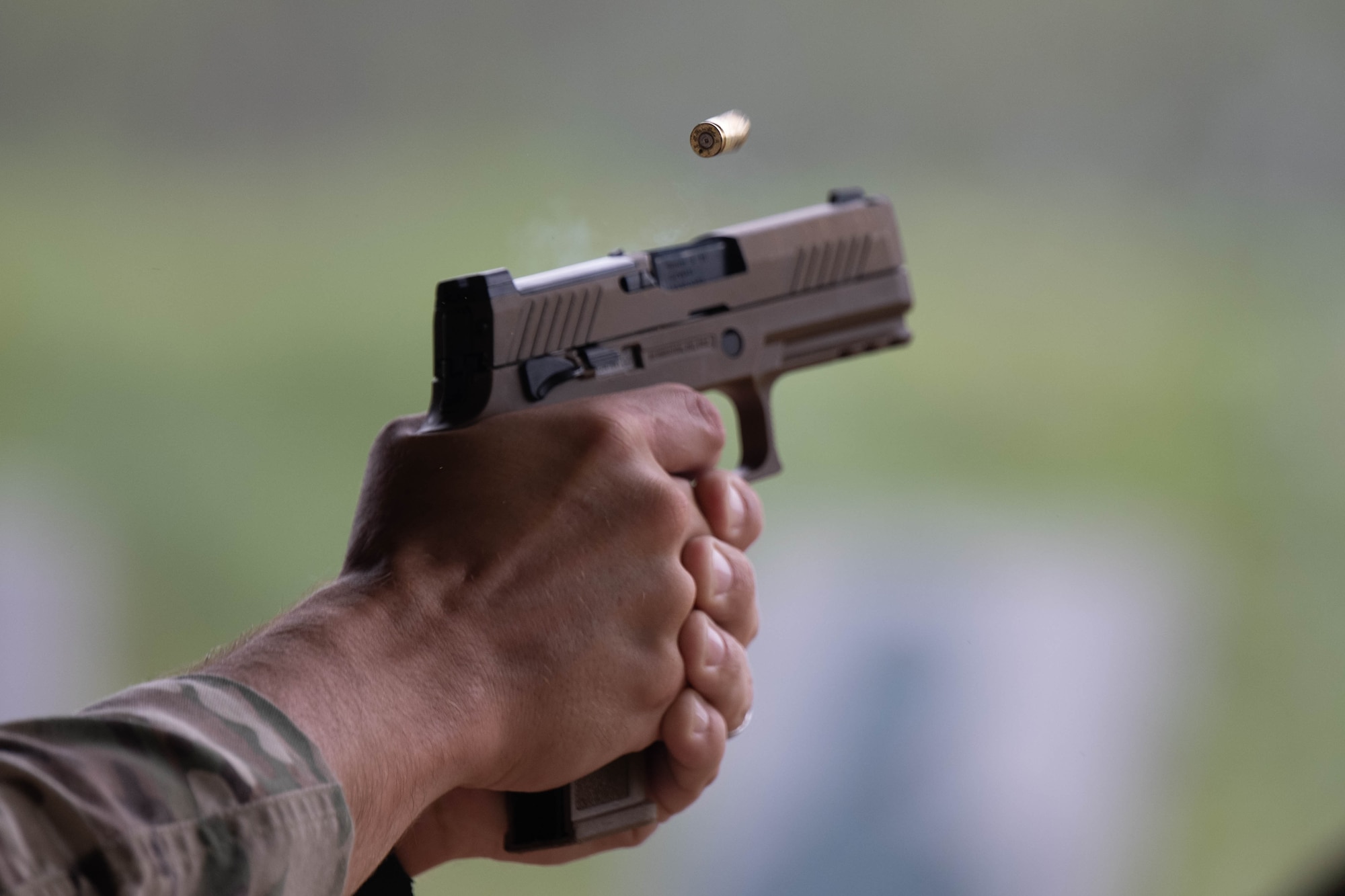 Bullet flys out of M18 pistol