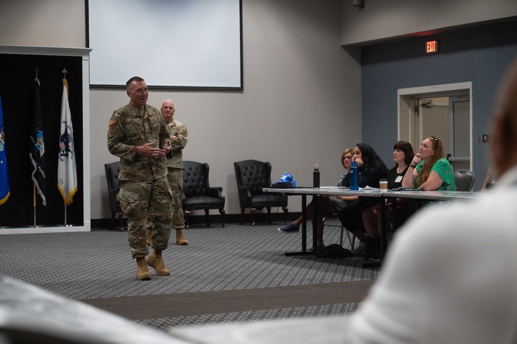 U.S. Air Force Chief Master Sgt. Derek Neill, 17th Training Wing command chief, and U.S. Air Force Col. Matthew Norton, 17th TRW commander, welcome educators at the Powell Event Center, Goodfellow Air Force Base, Texas, July 21, 2026. The Distinguished Educators’ Tour is an annual event where the Air Force Recruiting Service invites educators to visit a military installation for two days. (U.S. Air Force photo by Senior Airman Brian Lummus)