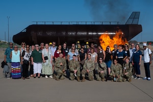 Educators pose for a group photo with U.S. Air Force recruiters during the Distinguished Educators’ Tour at the Louis F. Garland Department of War Fire Academy, Goodfellow Air Force Base, Texas, July 22, 2026. The DoW Fire Academy trains mission-ready airmen, joint-service members and allies in foundational intelligence and fire protection capabilities. (U.S. Air Force photo by Senior Airman Brian Lummus)
