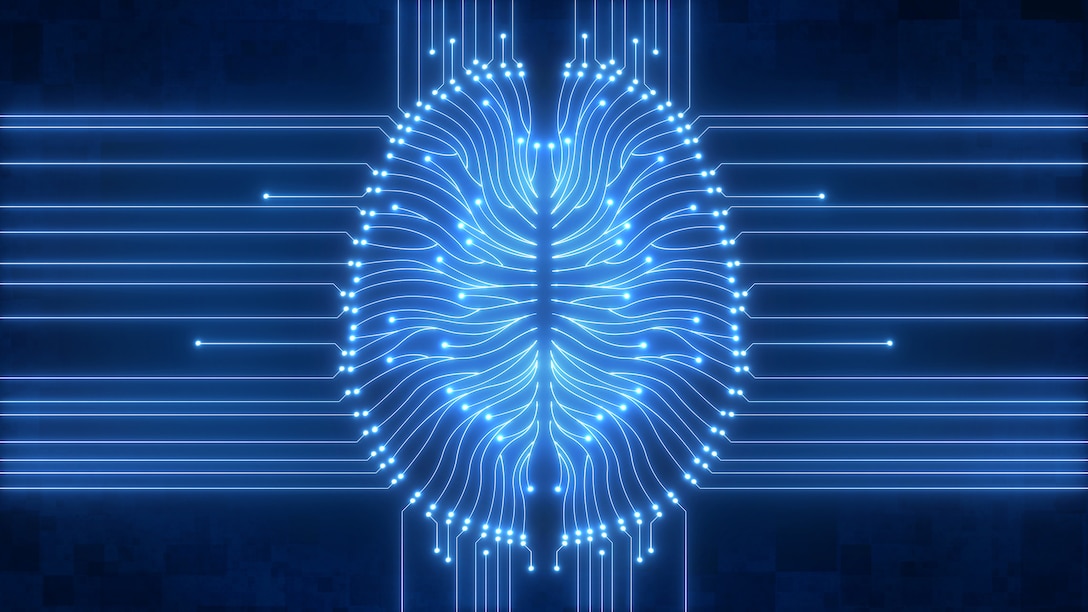 Blue computer brain circuit diagram concept illustrating AI. Glowing blue AI brain diagram as digital computer circuitry concept with wiring, neurons and connections, illustrating artificial intelligence and big data.