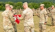 The Pennsylvania Army National Guard’s 856th Combat Engineer Company - Infantry activates during a formal ceremony on Strickler Field at Fort Indiantown Gap July 26, 2026. The 856th, which falls under the 56th Mobile Brigade Combat Team, was previously designated as Company A, 103rd Brigade Engineer Battalion, prior to that battalion’s inactivation in March as part of the brigade’s transition from a Stryker Brigade Combat Team to a Mobile Brigade Combat Team. (Pennsylvania National Guard photo by Wayne V. Hall)